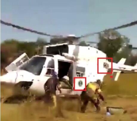 A screenshot of the video showing a logo on the side of the helicopter.